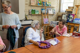 Two ladies knitting