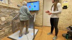 Cordia Member exercises on Cordia's Dividat Senso exergaming machine