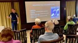 People with hearing aids listening to a speaker at Cordia at Grand Traverse Commons