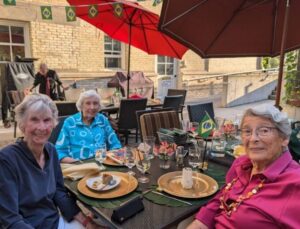 Cordia Members enjoying a meal on the patio during our Brazil night.